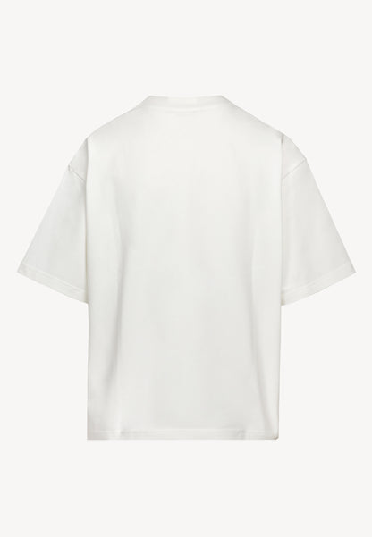 Kremowy T-shirt oversize z grafiką VIORA